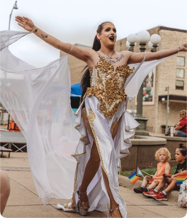Performer greeting the crowd at Oskaloosa Pride